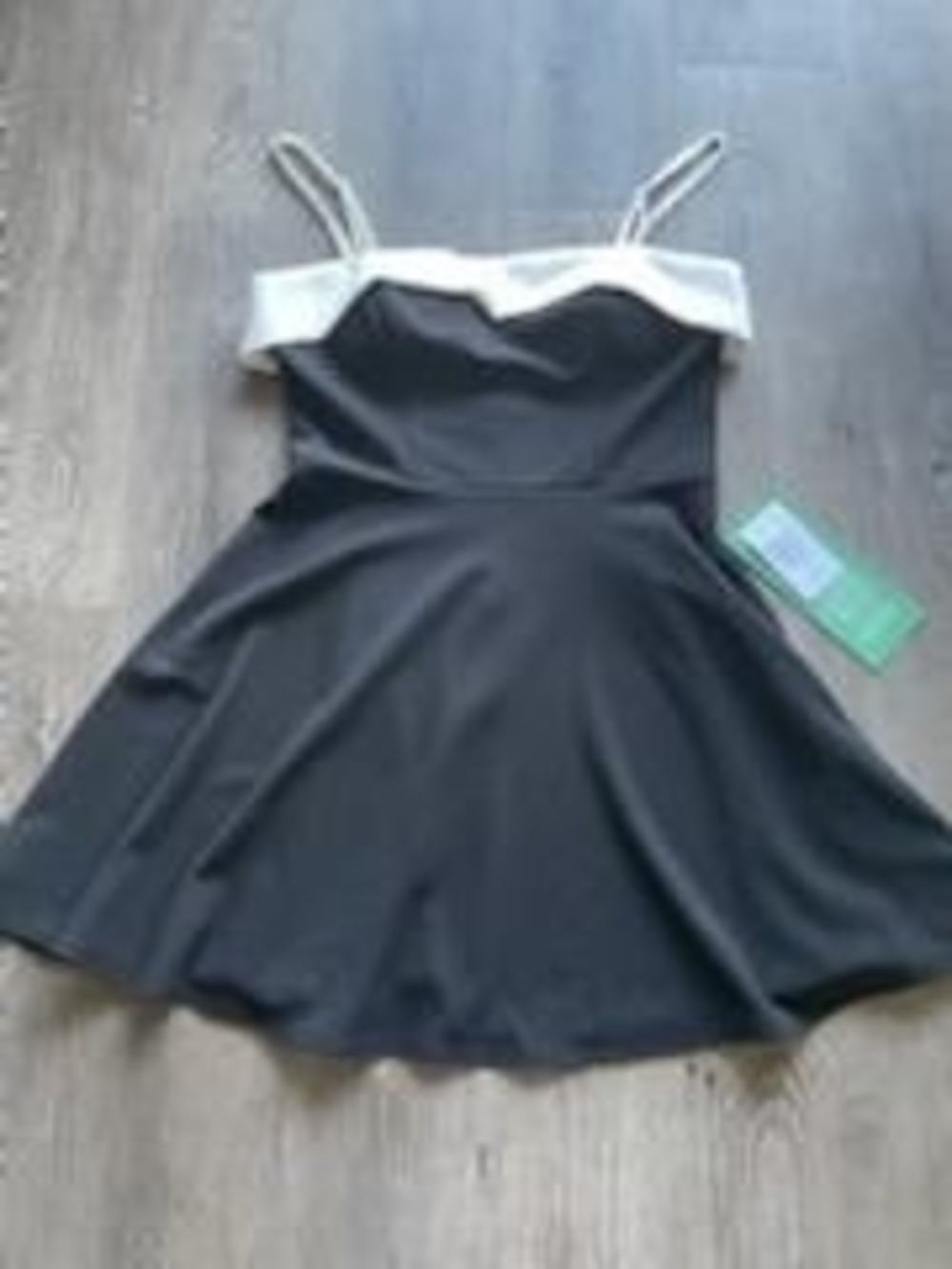 B. Smart Black Mini Dress with White Trim